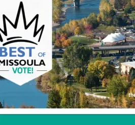 photo of downtown missoula montana and the clark fork river. there is text that says best of missoula vote and the ymca logo.